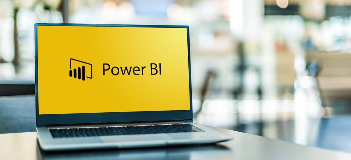 如何在 Microsoft Power BI 中向报表添加操作按钮？